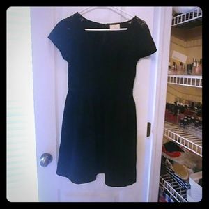 Black casual dress with lace accents